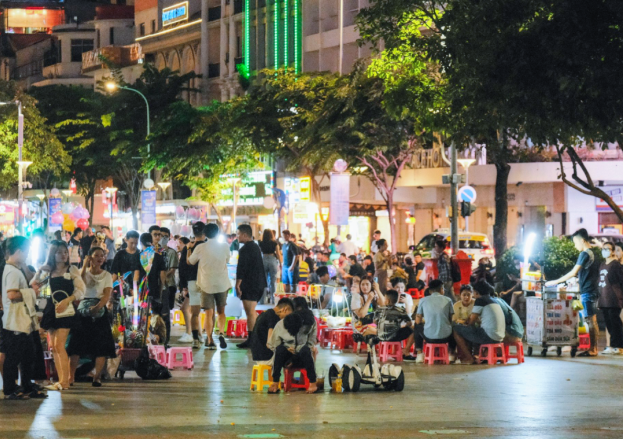 Stroll down Nguyen Hue walking street and feel the Pulse of Saigon