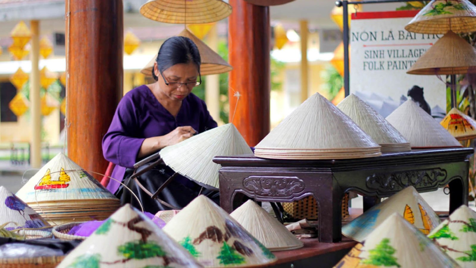 Visiting the Tay Ho craft village in Hue to admire the traditional Vietnamese conical hat-making