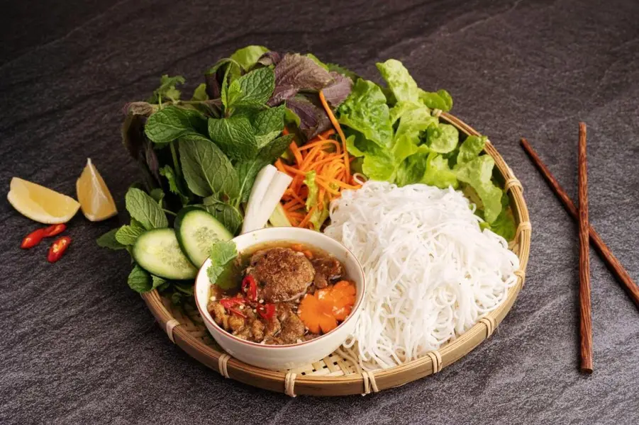 Don’t forget to savor the renowned "Bún chả" in Hanoi