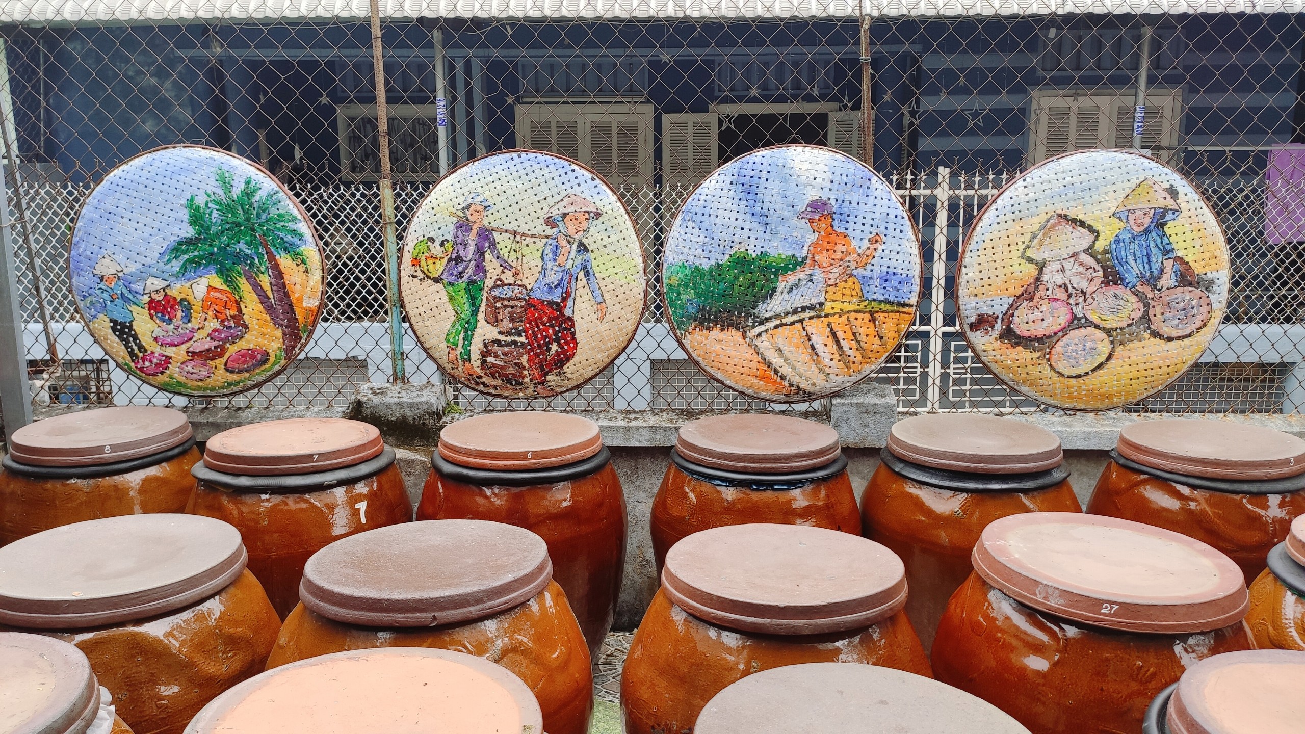 Learn about the traditional fish sauce-making process at Nam O fish sauce village