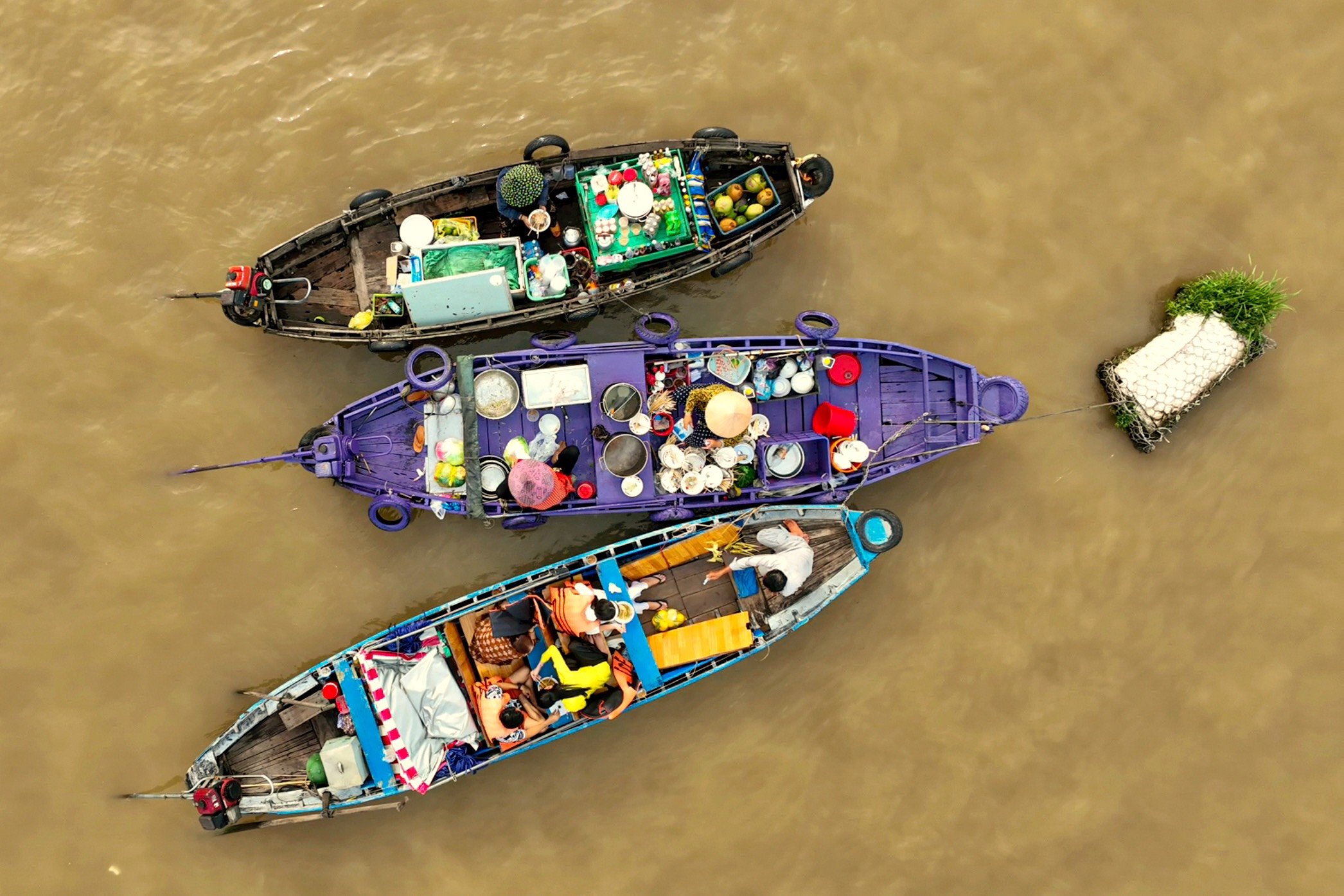 Discover the vibrant life of Cai Rang Floating Market in the Mekong Delta